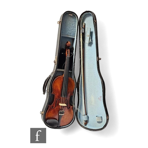 290 - An early 20th Century three quarter size violin,  bearing the label The London Violin Co. Limited, l... 