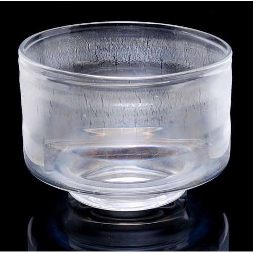 689 - A large later 20th Century Leerdam glass bowl with small circular foot below a wide cylindrical body... 