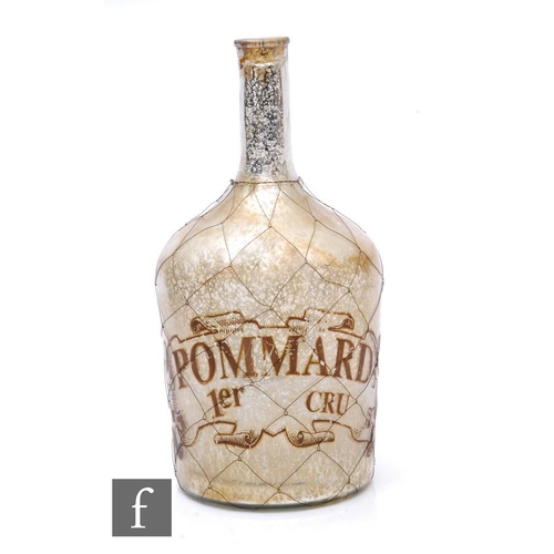 889 - A large 19th Century French bar display bottle of shouldered ovoid form with tall drawn neck, the in... 