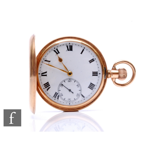 197 - A 9ct hallmarked crown wind full hunter pocket watch, Roman numerals to a white enamelled dial, case... 