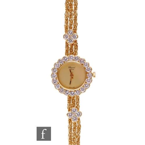 230 - An 18ct lady's Chopard manual wind wrist watch, circular champagne dial within a border of twenty br... 