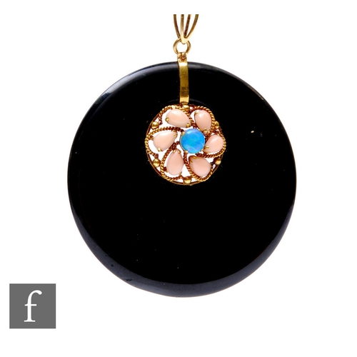 112 - A 14ct set black onyx, coral and opal set circular pendant, weight 27g, diameter 55mm, stamped 14k.