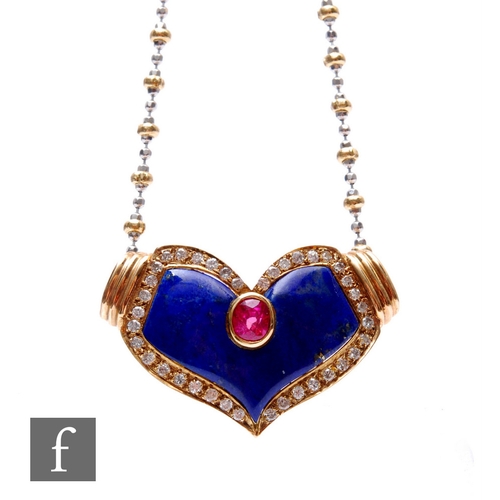 114 - A 14ct ruby, lapis lazuli and diamond set cushioned heart shaped pendant suspended from a 14ct yello... 