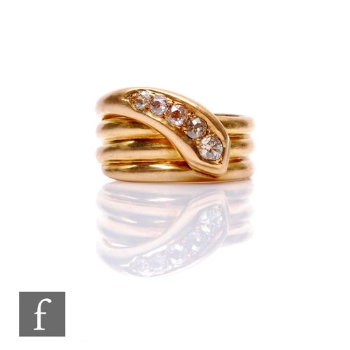 127 - An early 20th Century 18ct hallmarked three coil snake ring with five graduated old cut diamonds to ... 