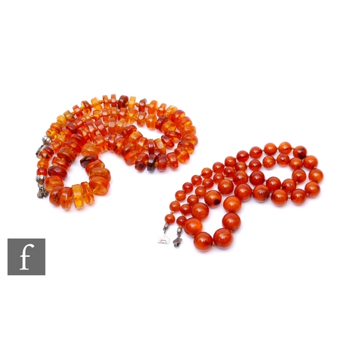 175 - Two rows of Baltic amber beads, lengths 72cm and 65cm. (2)