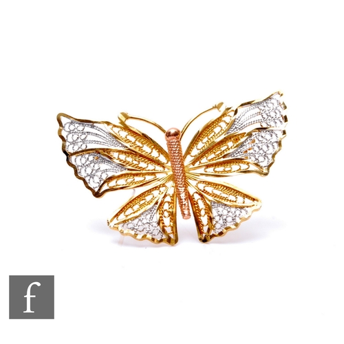 180 - A 9ct three coloured gold brooch modelled as a butterfly, weight 3g, width 4cm.