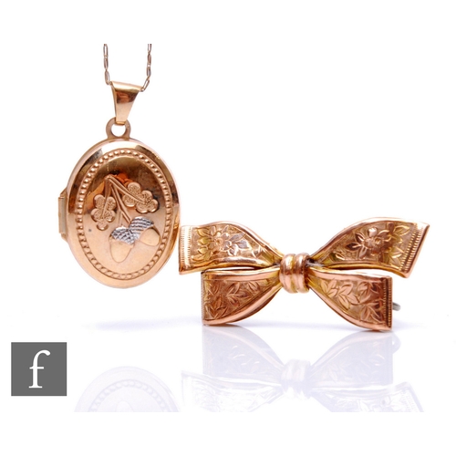 89 - A 9ct oval locket and chain, weight 2.5g, with a 9ct bar brooch modelled as a bow, weight 2.4g. (2)