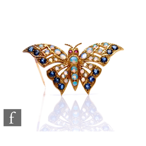 92 - A 9ct hallmarked opal, sapphire and ruby stone set brooch modelled as a butterfly, weight 5.6g, widt... 