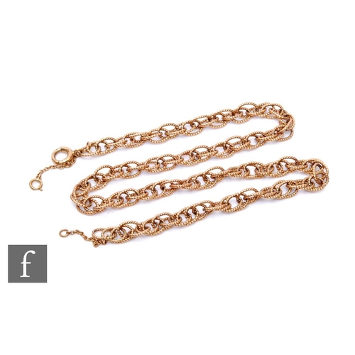 190A - A 9ct hallmarked open rope twist chain, weight 28.5g, length 44cm, terminating in bolt ring fastener... 