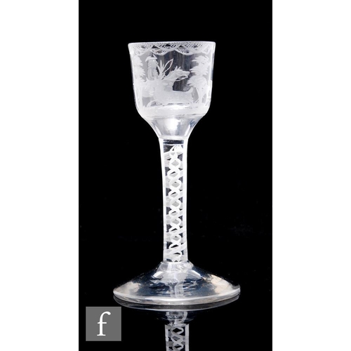 95 - An 18th Century drinking glass circa 1765, the ogee bowl engraved with a hunting scene of a rider on... 