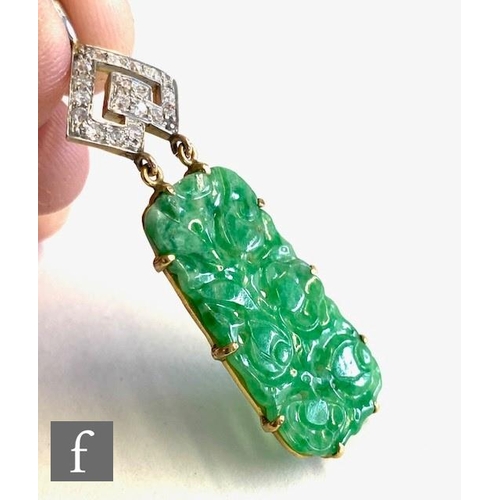 111 - An early 20th Century 14ct jade and diamond pendant, cushioned rectangular pierced and carved pendan... 