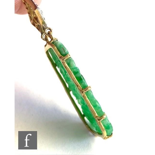 111 - An early 20th Century 14ct jade and diamond pendant, cushioned rectangular pierced and carved pendan... 