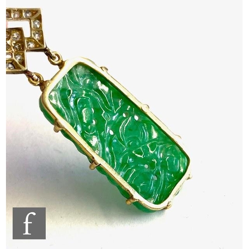 111 - An early 20th Century 14ct jade and diamond pendant, cushioned rectangular pierced and carved pendan... 