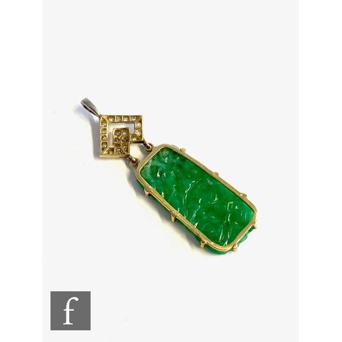 111 - An early 20th Century 14ct jade and diamond pendant, cushioned rectangular pierced and carved pendan... 