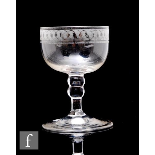 155 - A Regency period Davenport Patent drinking glass circa 1810, the ovoid bowl acid etched to the upper... 