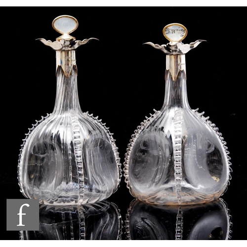 748 - A pair of Victorian hallmarked silver and glass decanters of dimple knocked globe and shaft form, wi... 