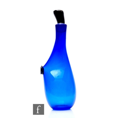 755 - A later 20th Century Simon Moore studio glass decanter of abstract sleeve form in deep blue with app... 