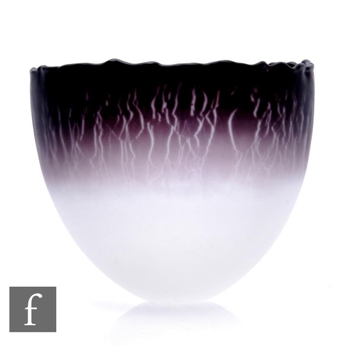 756 - A small later 20th Century Malcolm Sutcliffe studio glass bowl of ovoid form with a wave rim in a gr... 