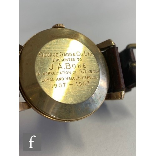 208 - A 9ct hallmarked Garrards wrist watch, gilt Arabic numerals to a white circular dial, case diameter ... 