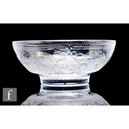 750 - A large mid 20th Century Tudor Crystal glass bowl of footed circular form decorated by Jack Lloyd wi... 