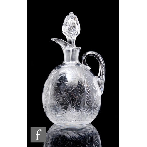 763 - An early 20th Century Stourbridge clear crystal glass claret jug in the manner of Stevens & Will... 