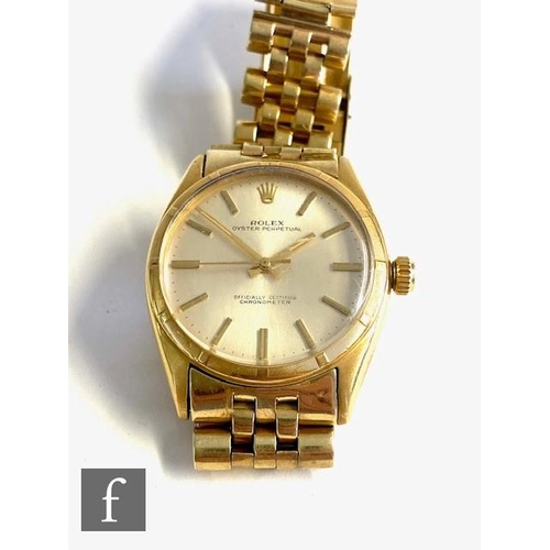 229 - An 18ct Rolex Oyster Perpetual wrist watch, ref 6085, gilt batons to a silvered circular dial, case ... 