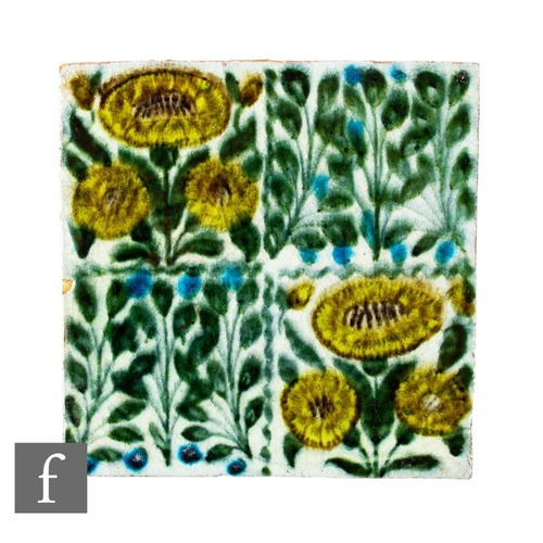 415 - A 19th Century William De Morgan 6 inch plastic clay Bedford Park Daisy tile, decorated with quarter... 