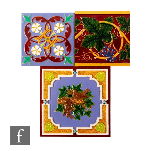 168 - Three 19th Century Minton & Co dust pressed majolica tiles, including an 8 inch tile moulded in ... 