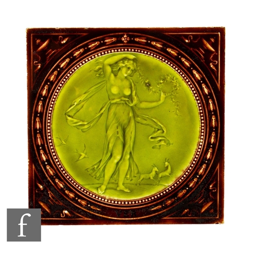 170 - A 19th Century Minton Hollins & Co 6 inch dust pressed tile, green and brown tonal glaze, decora... 