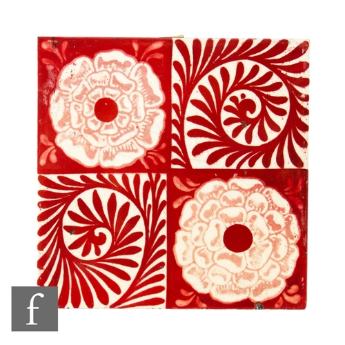 485 - A 19th Century William De Morgan (attributed) 6 inch dust pressed lustre tile, tonal red and pink ro... 