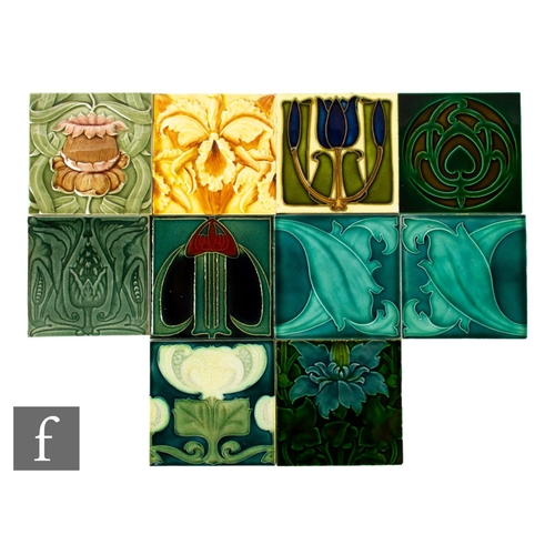 486 - A collection of 19th Century dust pressed 6 inch tiles, all with relief moulded or tube lined Art No... 