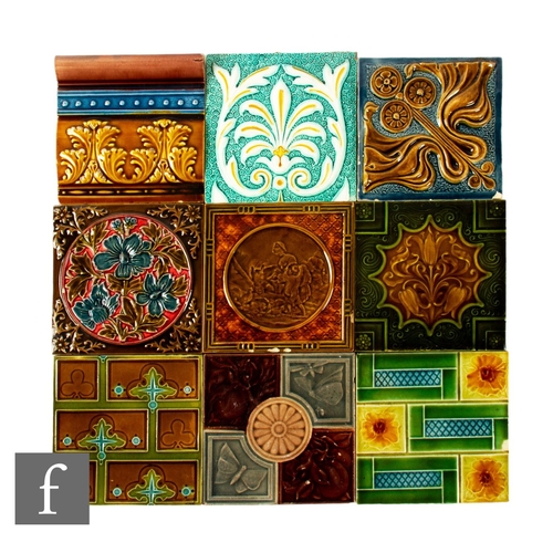 488 - An assorted collection of 19th and 20th Century 6 inch dust pressed tiles, makers to include Garter ... 