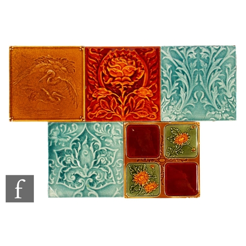 313 - A collection of 19th Century Pilkington's 6 inch dust pressed embossed tiles to include examples wit... 