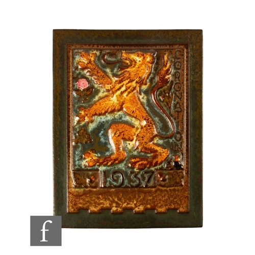 778 - An early 20th Century Malkin dust pressed commemorative panel, decorated in high relief with a lion ... 