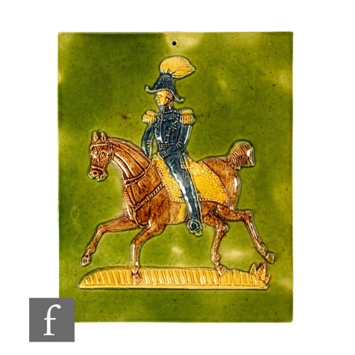 548 - A 20th Century plastic clay pictorial tile, high relief moulded decoration of the Duke of Wellington... 