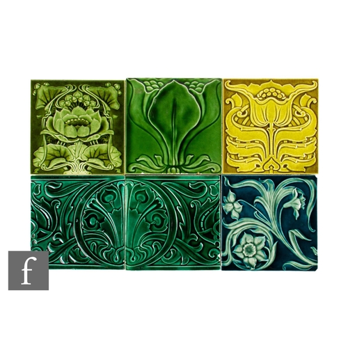 558 - A collection of 19th Century 6 inch dust pressed embossed floral tiles, to include examples from Hen... 