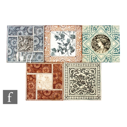 559 - A collection of five dust pressed 6 inch tiles, each with transfer printed decoration with a central... 