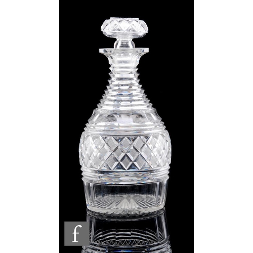 238 - A 19th Century Anglo Irish clear cut crystal glass decanter of Prussian form circa 1820, the shoulde... 