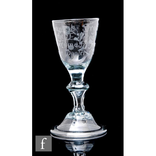 15 - An 18th Century continental drinking glass circa 1780, the ovoid bowl engraved with a dedicated insc... 