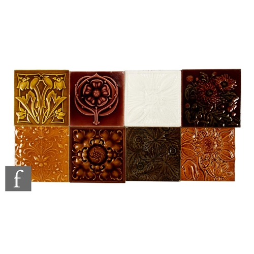 598 - A collection of eight 19th Century 6 inch dust pressed tiles, embossed stylised floral designs, incl... 