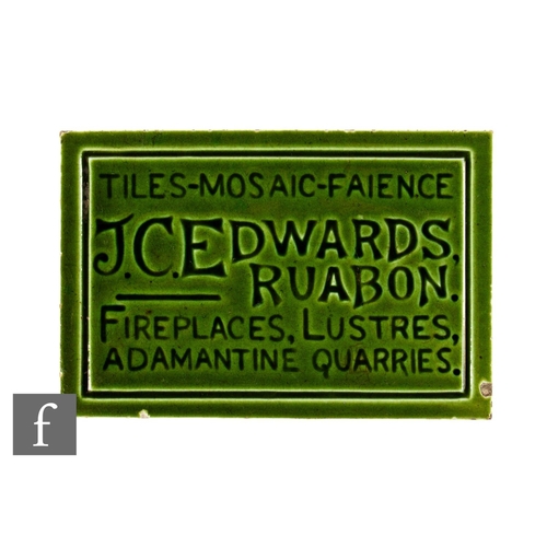 838 - An early 20th Century dust pressed rectangular advertising tile for JC Edwards, the front impressed ... 