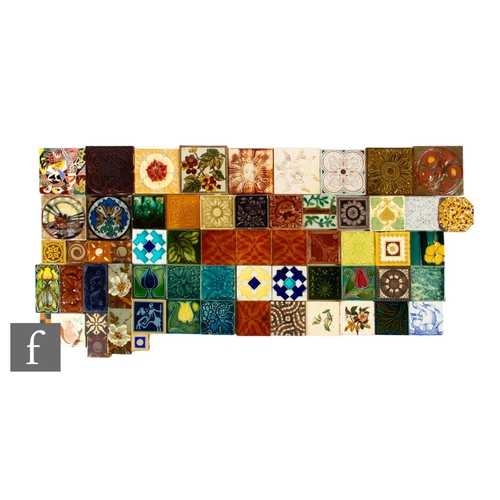 630 - A collection of 19th Century dust pressed tiles, including 4 inch examples, spacer tiles and border ... 