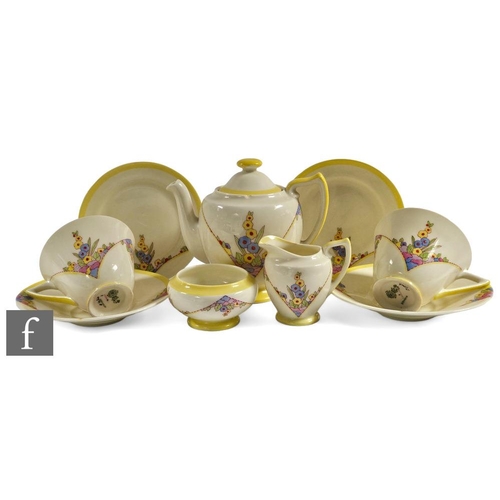 102 - A 1930s Art Deco Royal Doulton early morning breakfast service, comprising teapot, milk jug, sugar, ... 