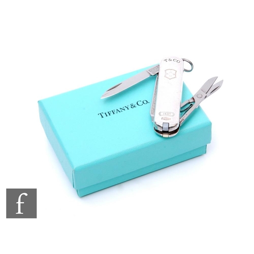 1 - A Tiffany & Co silver penknife/manicure set, sold with original box and pouch, length 6cm.PLEASE... 