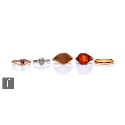 13 - Four 9ct rings to include a signet and a single stones amethyst, total weight 14g, with a 22ct weddi... 