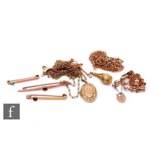 14 - A parcel lot of 9ct jewellery to include a locket and chain, bar brooches and a gate bracelet, total... 