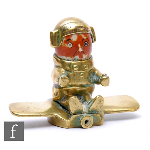 270 - A brass car mascot by John Hassall (1868-1948), modelled as an aviator, lacking propeller and sticks... 