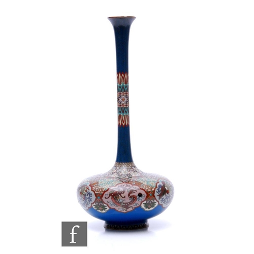 29 - An early 20th Century Japanese cloisonne bottle vase, the bulbous body rising to a slender neck, dec... 