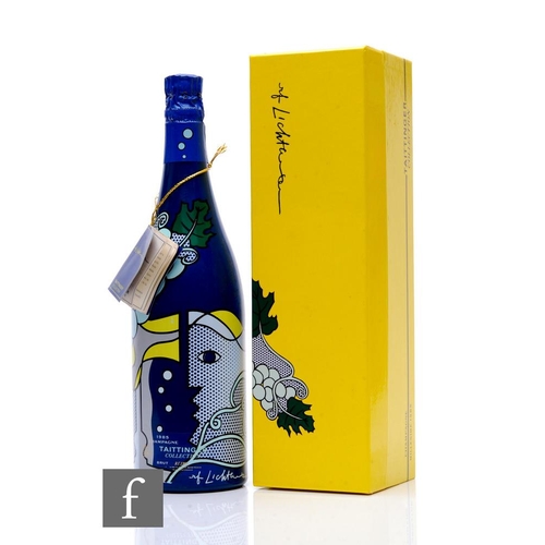 521 - A bottle of Taittinger Collection 1985 champagne, bottle designed by Roy Lichtenstein, edition of 10... 