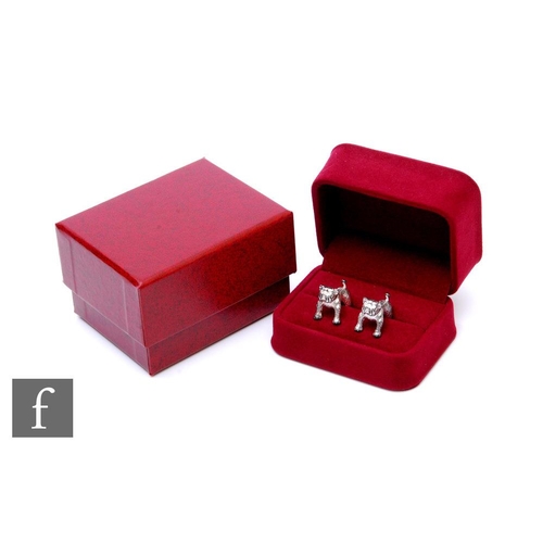 706 - A pair of Asprey silver hallmarked cufflinks, in the form of a bulldog, length 2cm, red box and oute... 